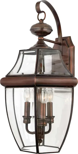 Quoizel Newbury Outdoor Wall Lantern, 23 Inch 3-Light Aged Copper Sconce, French Country Exterior Lantern Fixture, E12 Base, Clear Glass, Outside Lights for Patio, Porch, Garage or Yard