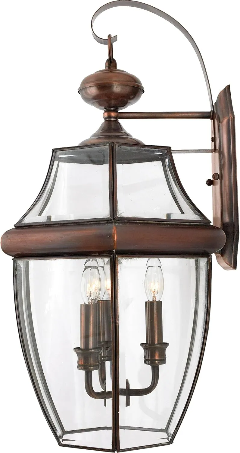 Quoizel Newbury Outdoor Wall Lantern, 23 Inch 3-Light Aged Copper Sconce, French Country Exterior Lantern Fixture, E12 Base, Clear Glass, Outside Lights for Patio, Porch, Garage or Yard