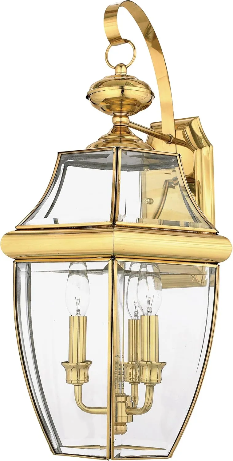 Quoizel Newbury Outdoor Wall Lantern, 23 Inch 3-Light Polished Brass Sconce, French Country Exterior Lantern Fixture, E12 Base, Clear Glass, Outside Lights for Patio, Porch, Garage or Yard